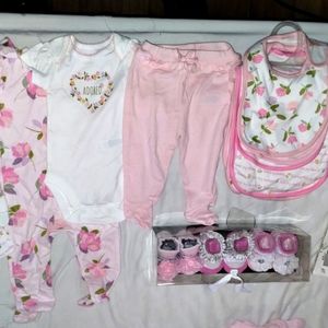 New baby clothes never used o-3 mon